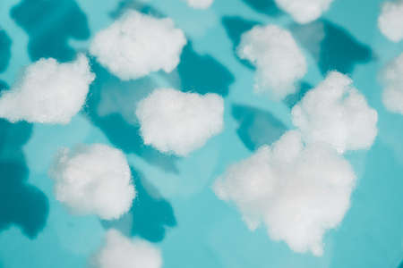 blue sky and puffy cloudsの写真素材