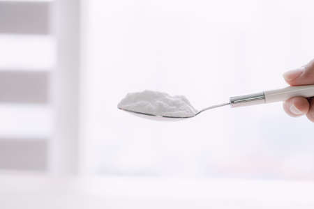 white powder on a spoonの写真素材