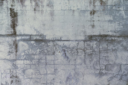 old and broken concrete wallの写真素材