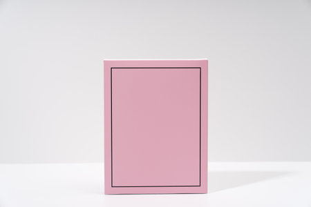pink card on white backgroundの写真素材