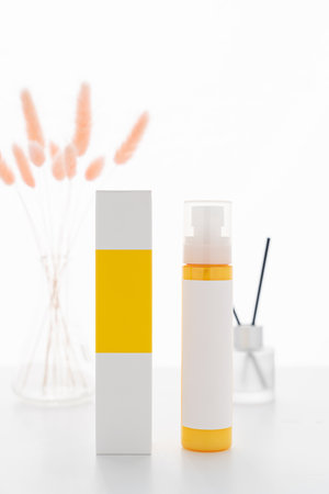 Cosmetic container in front of diffuser backgroundの写真素材