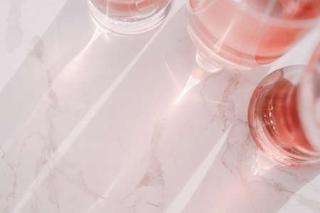 Pink drink on a marble backgroundの写真素材