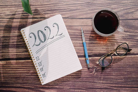 Coffee and glasses on the table New Year's resolutions for 2022