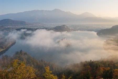 Autumn view of Bled with the island and the castle from Mt  Osojnica, and Mt  Stol in the backroundのeditorial素材