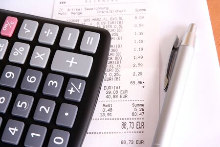 business concept with calculator and billの写真素材