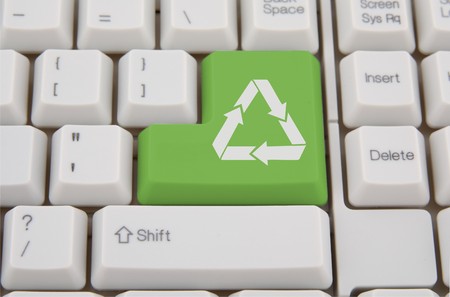Computer keyboard - green  recycling keyの写真素材