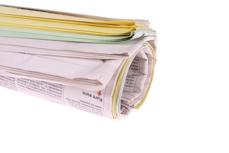 Roll of newspapers, isolated on white backgroundの写真素材