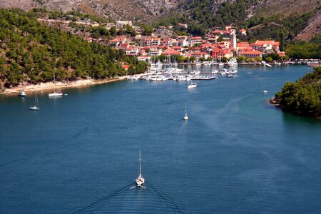 Aerial view of marina on island, Croatia (landscape)の写真素材