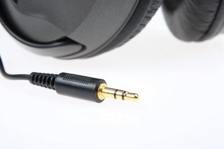 mini jack with stereo phone isolated on white の写真素材