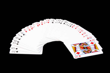 Playing cards - isolated on blackのeditorial素材