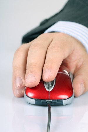 Computer mouse and man's handの写真素材