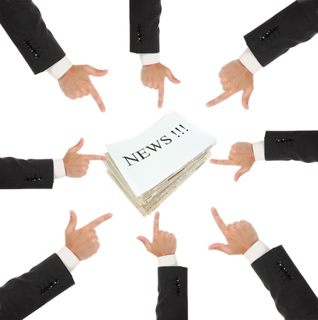 Hands and newspaper, isolated on white backgroundの写真素材