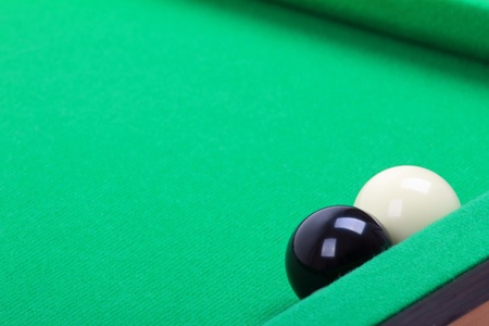 black and white ball on the billiard tableの写真素材