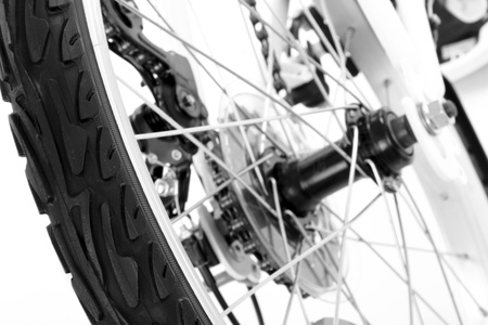 Wheel with tire of bicycle isolated on white の写真素材
