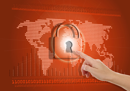 Hand pushing virtual security button on digital backgroundの写真素材