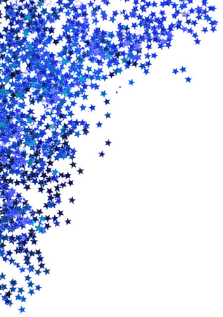 Blue stars in the form of confetti on white backgroundの写真素材