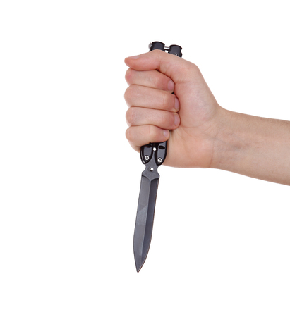 hand holding knife isolated on white backgroundの写真素材