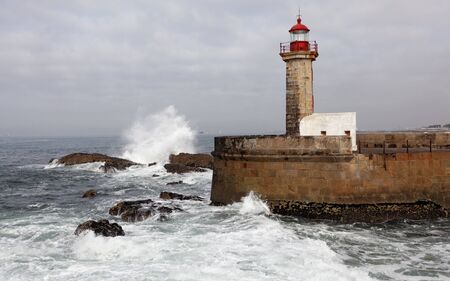 The Felgueiras Lighthouse at Douro river mouth in Foz do Douro, Porto, Portugal.の写真素材