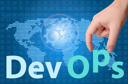 DevOps (Development & Operations) concept sign with hand.の写真素材