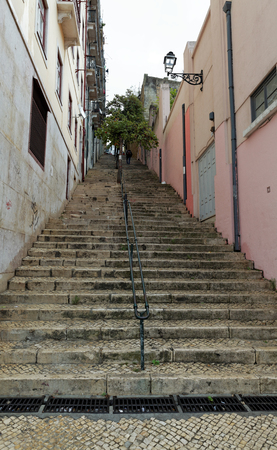Lisbon street with stairs, Portugal (stairs going up to the Castelo Sao Jorge)の写真素材