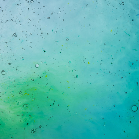 Water and paint textures aerial view, abstract backgroundの写真素材