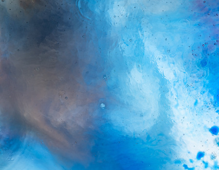 Water and paint textures aerial view, abstract background