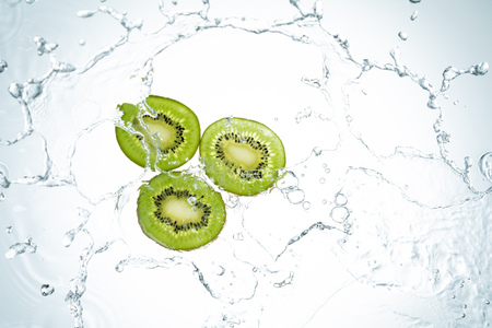 Kiwi Water Splash on White Backgroundの写真素材