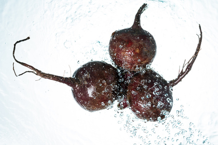 Beets Water Splash on white Backgroundの写真素材
