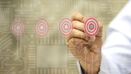 Businessmen choose targets on the system panel.