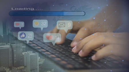 Hand Press Keyboard uses social media online,social media response,network communication.の写真素材