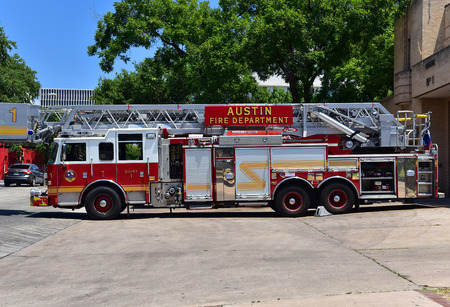 Fire truck from Austin, Texas.August 2015.Fire truck standing in the driveway in front of the fire station.Horizontal view.のeditorial素材