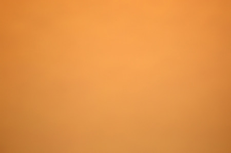 Orange sheet of cardboard with a smooth and delicate surfaces.Ideal for background.の写真素材