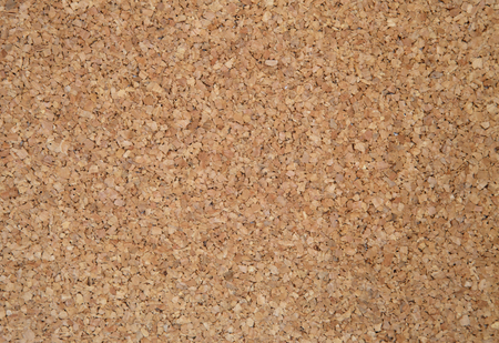 Cork sheet photographed up close. Exactly you can see the structure of cork and a single, irregular elements. Ideal as a background and texture.Brown cork.Horizontal view.の写真素材