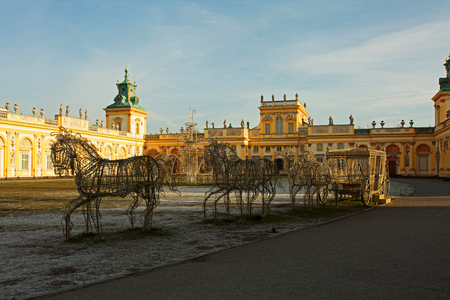 Poland-Warsaw,Wilanow-December 2015.Light decorations in the shape of a carriage with horses in front of the Royal Palace in Wilanow,in Poland,Warsaw 2015.Editorial.のeditorial素材