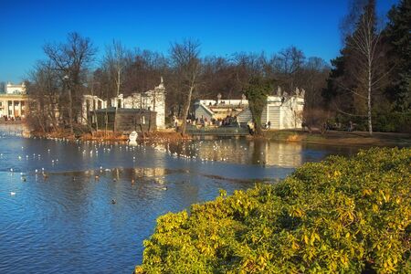 The February morning, view of the pond, the theater on the water and part of the Palace on the Water in Lazienki Royal Park in Warsaw in february. Horizontal view.のeditorial素材