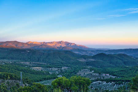 Morning, overlooking the red-lit mountain peaks in Cabeco D'or.Horizontal viewの写真素材