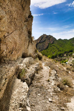 In the Cabeco D'or mountains View of distant mountain peaks on a beautiful sunny day under blue sky.Vertival viewの写真素材