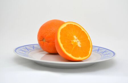 Isolated citrus on plate.の写真素材