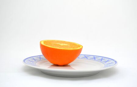 Isolated citrus on plate.の写真素材