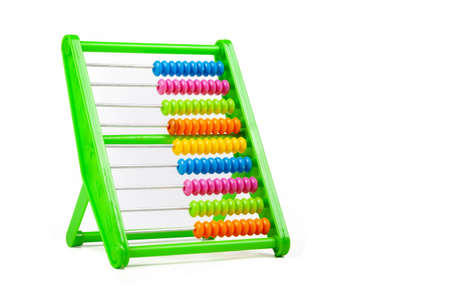 Simple colorful classic abacus toy isolated on white, cut out, beads aligned. Teaching aids,...