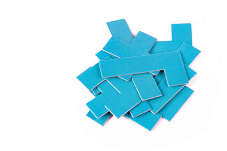 Pile of scattered blue geometrical pieces, simple shapes stack, heap Bunch of unlinked not connected...
