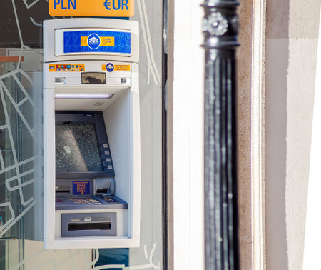 Cracow, MaÅopolska / Poland - circa January 2019: Broken, out of order Euronet ATM, cash machine, shattered damaged front glass screen. Atm theft, money safety concept, out of service, side viewのeditorial素材