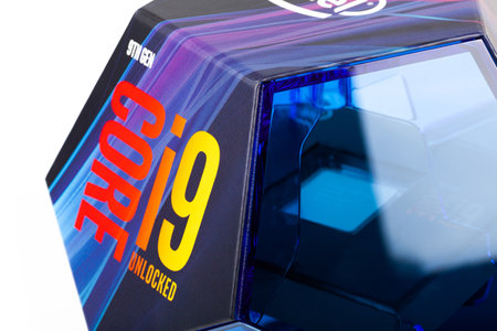 Cracow, Malopolska / Poland - October 12 2019: Intel Core i9 9900k CPU, modern 5ghz Coffee Lake processor in a original blue box side view, macro, closeup. Product shot isolated on white, die visibleのeditorial素材