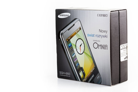 Samsung Omnia SGH-i900 old touch screen mobile phone Windows Mobile 6 smartphone product shot isolated Original Polish product box from 2008 / 2009のeditorial素材