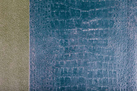Abstract creased leather old dark blue book hard cover surface background texture, closeup. Elegant rough stylish book hardcover structure retro vintage style simple backdrop design, full frame shotの写真素材