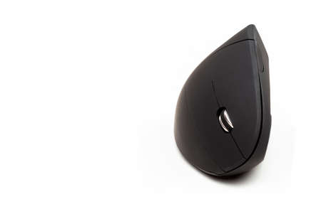 Simple Ergonomic wireless computer mouse, vertical fin design desktop pc mouse object isolated on white. Modern technology for preventing wrist pain and strain abstract conceptの写真素材