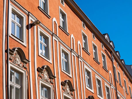 Krakow, Poland, Old Town historical tenement houses, facade shot, closeup. Polish urban architecture, building exterior, landmarks, travel destinationsのeditorial素材
