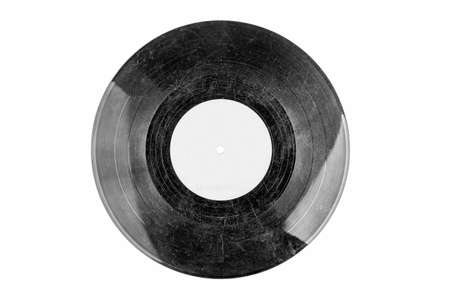 Old fashioned damaged scratched vinyl record, black and white hdr, object isolated on white background, cut out, empty blank label. Classic vintage retro vinyl disc with many deep scratches, top viewの写真素材