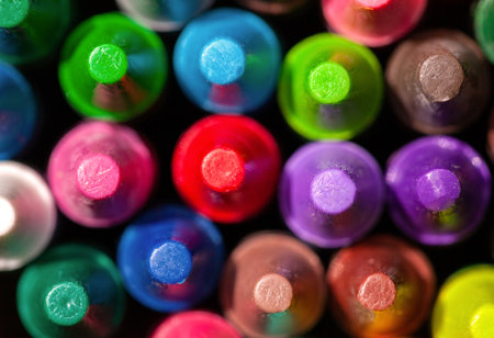 Colorful group pf wax crayons, large wax crayon set top view, macro, extreme closeup, detail. Vivid background texture, shot from above. Early school education, learning concept, simple backdropの写真素材