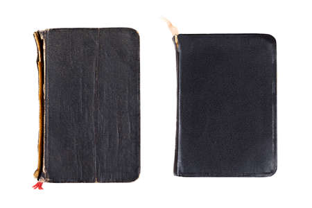 Two simple small old blank retro closed books, black book front covers, table top view, objects isolated on white background, cut out, nobody. Pair of vintage books, shot from above, fake leatherの写真素材
